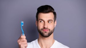man with a toothbrush